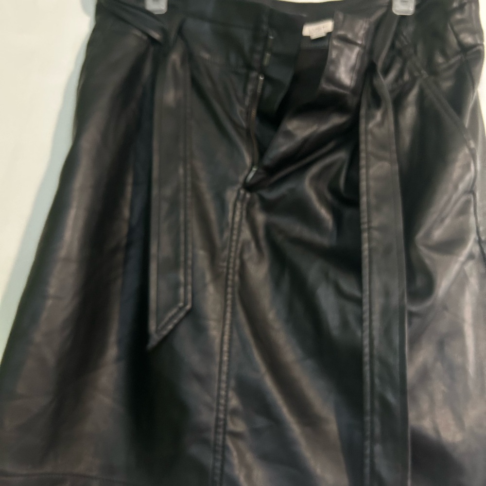 Women’s black belted faux leather skirt
